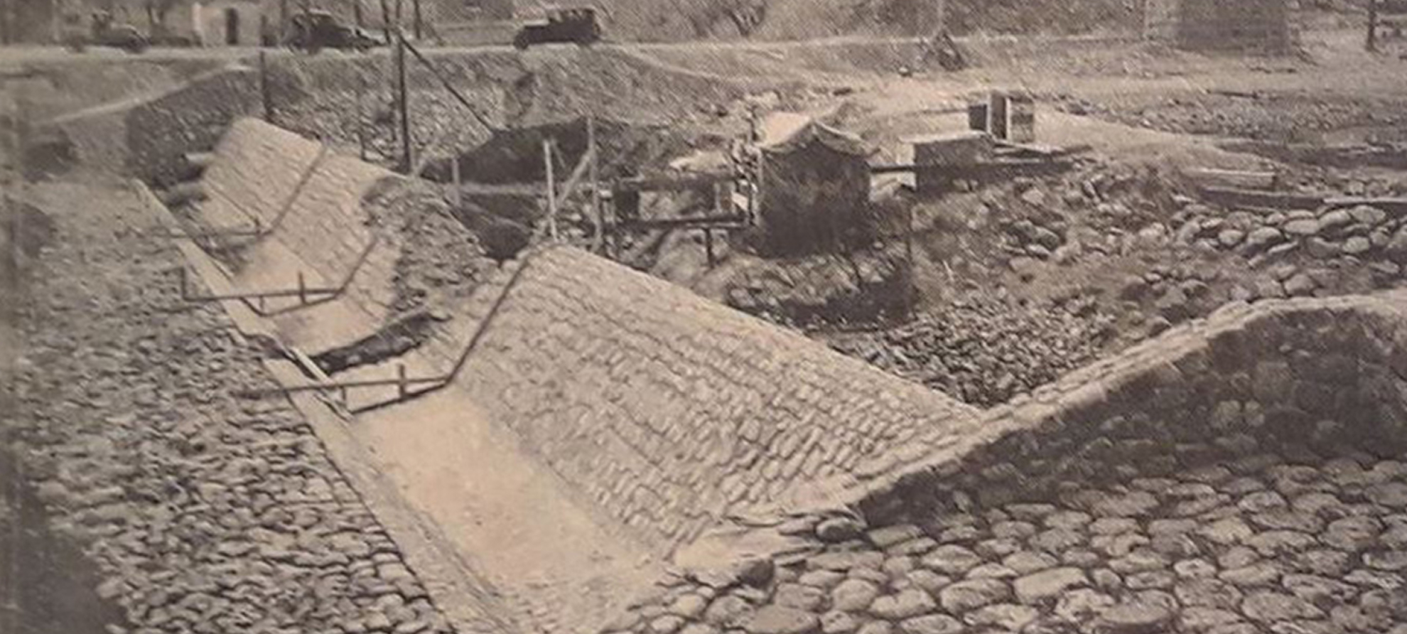 Old image of a low head dam from a newspaper